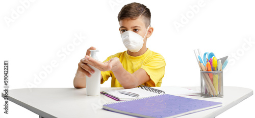 Small child with face mask at school and disinfecting hands.