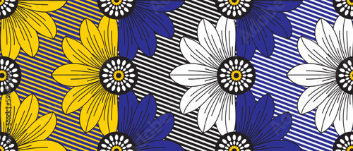African wax print pattern. seamless beautiful Kitenge, chitenge, dutch wax, and Angara style. fashion design in colorful. yellow, blue, and white botanical flowers. African Wax Print Fabric.