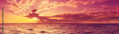 Seascape in the evening. Sunset over the sea with the beautiful blazing sky