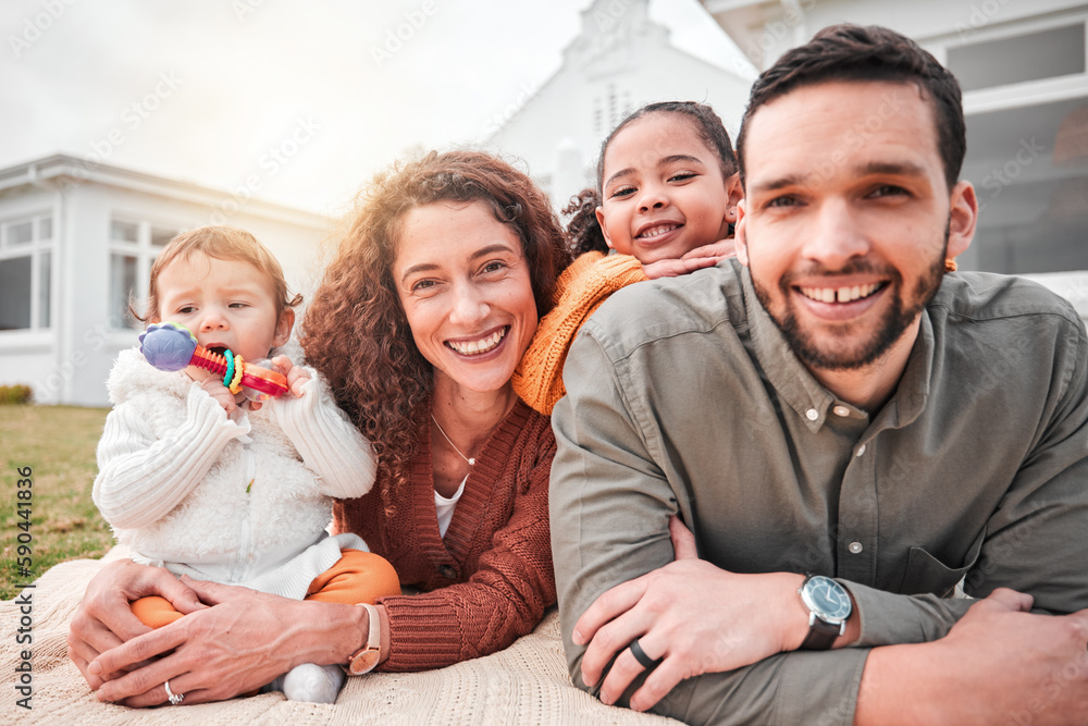 Relax, picnic and portrait of a happy family bonding outside a house feeling excited and happiness. Smile, interracial and mother with children, kids and father with care together on vacation Relax, picnic and portrait of a happy family bonding outside a house feeling excited and happiness. Smile, interracial and mother with children, kids and father with care together on vacation