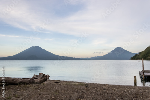 Breathtaking Landscape of Lake Atitlán in the Guatemalan Highlands. This stunning lake, nestled in the Sierra Madre mountain range, is a massive volcanic crater in Guatemala's southwestern highlands