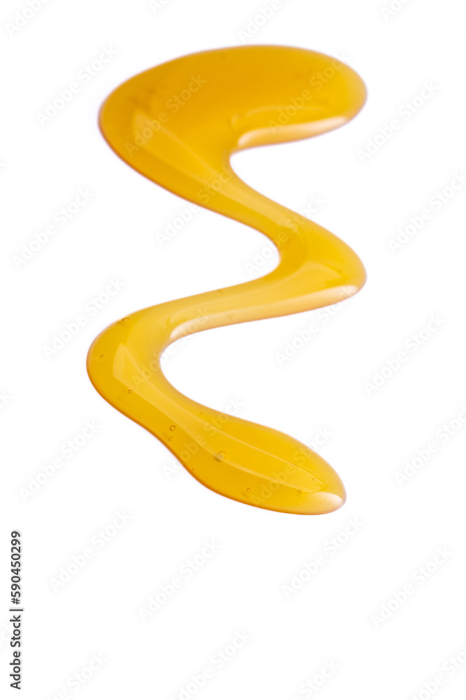 Honey drop on the white background Honey drop on the white background