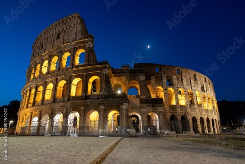 View of the historic Colosseum in Rome, Italy with the night sky