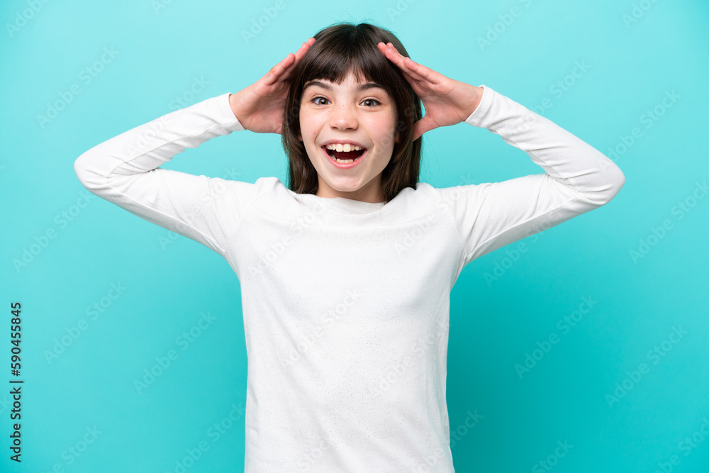 Little caucasian girl isolated on blue background with surprise expression Little caucasian girl isolated on blue background with surprise expression