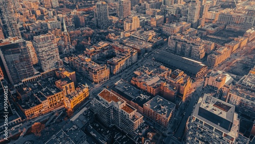 Photography Aerial view of the beautiful buildings of Toronto during a golden sunset