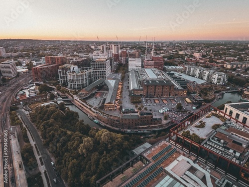 Aerial view of the Kings Cross rail hub under a cinematic sunset sky © Demetrios Vassiliades/Wirestock Creators