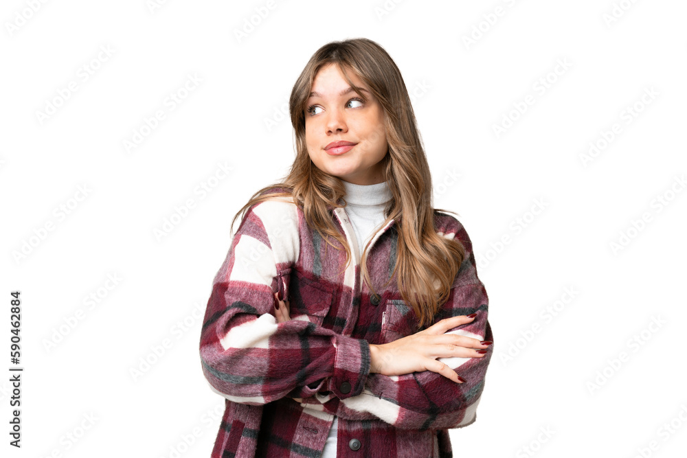 Young girl over isolated chroma key background making doubts gesture while lifting the shoulders Young girl over isolated chroma key background making doubts gesture while lifting the shoulders
