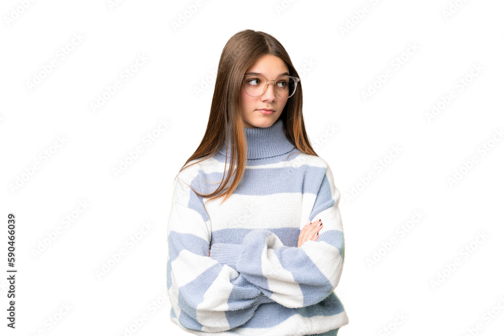 Teenager girl over isolated chroma key background keeping the arms crossed Teenager girl over isolated chroma key background keeping the arms crossed
