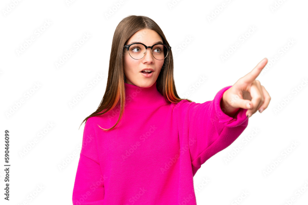 Teenager girl over isolated chroma key background pointing away Teenager girl over isolated chroma key background pointing away