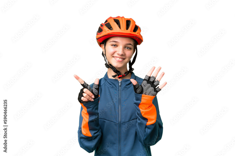 Teenager cyclist girl over isolated chroma key background counting seven with fingers Teenager cyclist girl over isolated chroma key background counting seven with fingers