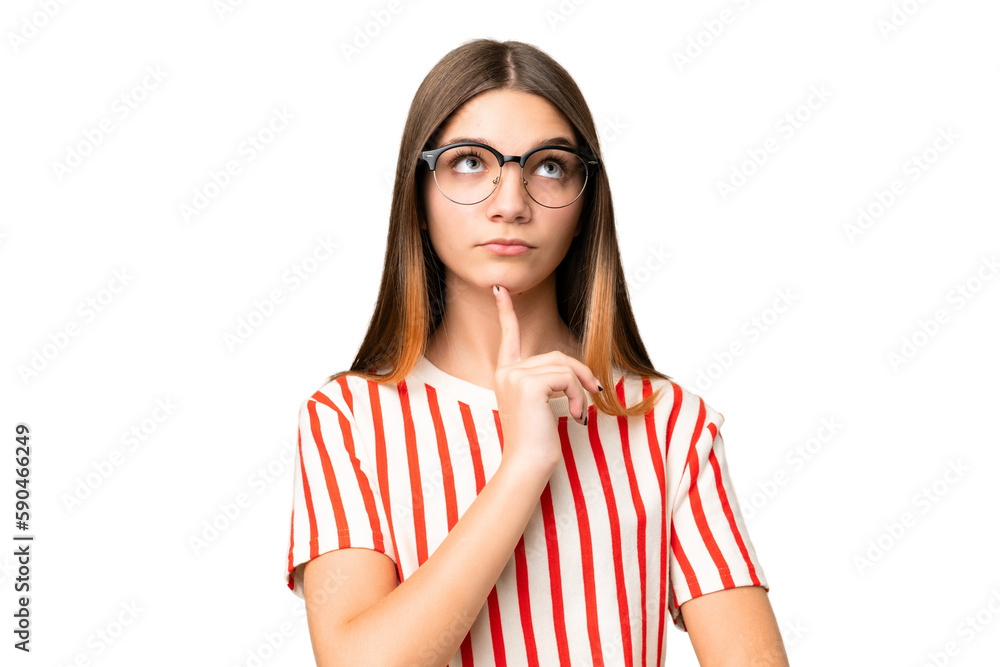 Teenager girl over isolated chroma key background With glasses and looking up Teenager girl over isolated chroma key background With glasses and looking up