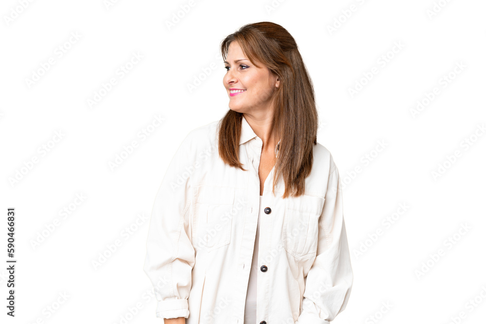 Middle age woman over isolated background looking side Middle age woman over isolated background looking side