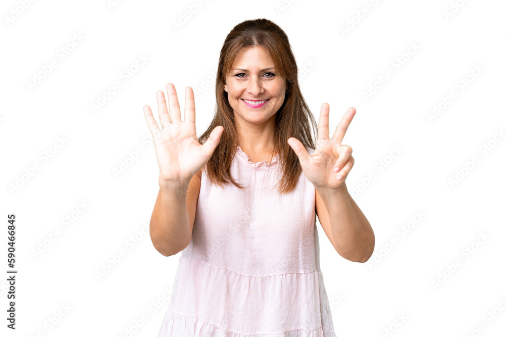 Middle age woman over isolated background counting eight with fingers Middle age woman over isolated background counting eight with fingers
