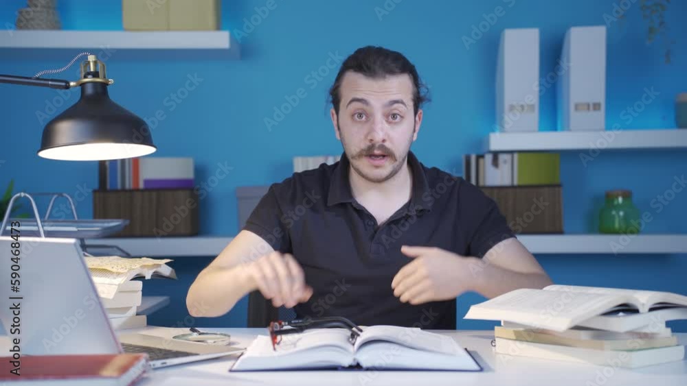 Man giving motivational and pep talk.
Man working in his office looks at camera and gives motivational and inspirational speech.
Man giving motivational and pep talk.
Man working in his office looks at camera and gives motivational and inspirational speech.