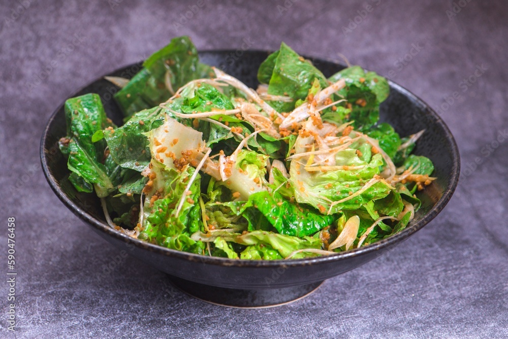 Close-up shot of a salad with lettuce in a bowl Close-up shot of a salad with lettuce in a bowl