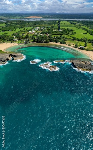 Vertical shot of a beautiful sea on a sunny summer day