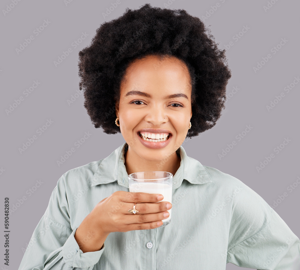 Portrait, woman and smile with milk in studio, white background and backdrop for healthy diet. Female model, glass and calcium of smoothie, vanilla milkshake and nutrition of detox weight loss drink Portrait, woman and smile with milk in studio, white background and backdrop for healthy diet. Female model, glass and calcium of smoothie, vanilla milkshake and nutrition of detox weight loss drink