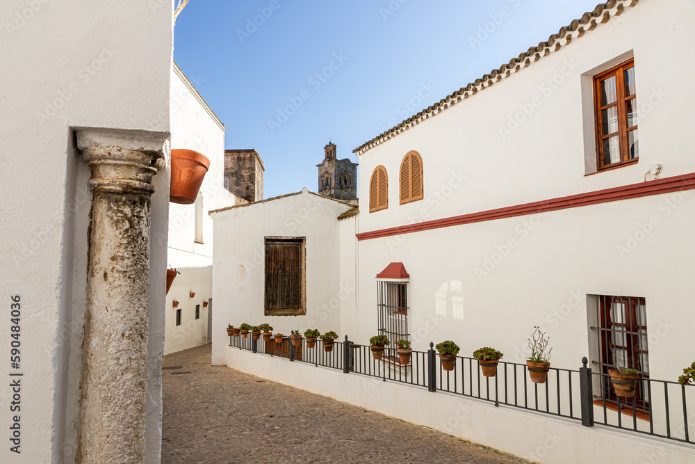 Arcos de la Frontera, Spain. One of the streets of the Old Town, with a Roman column and capital in one corner