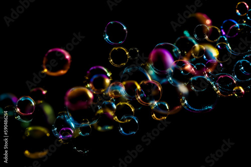 Colorful soap bubbles background. Rainbow soap bubbles on a dark background. Bright foam bubbles fly on black background. Generative AI.