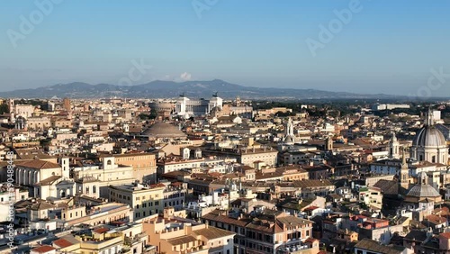 Tutti i principali monumenti di Roma visti dal drone.
Spettacolare vista aerea di Roma. Pantheon, Cupola di San Pietro, Campidoglio, Stadio Olimpico, Farnesina, Quirinale, Altare della Patria, Castel  photo