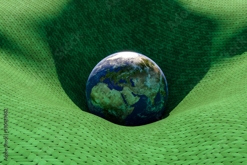 Fototapeta Naklejka Na Ścianę i Meble -  earth globe that has fallen into fabric - 3D Illustration