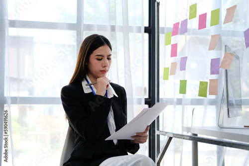 .Asian female creative team uses post-it notes to share sticky notes on glass walls. Asian businesswoman design planning and brainstorming on sticky history concepts. Free Download .Asian female creative team uses post-it notes to share sticky notes on glass walls. Asian businesswoman design planning and brainstorming on sticky history concepts. - GFXLoad