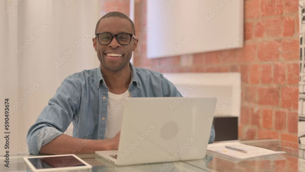 Yes, African Man Shaking Head in Acceptance at Work Yes, African Man Shaking Head in Acceptance at Work