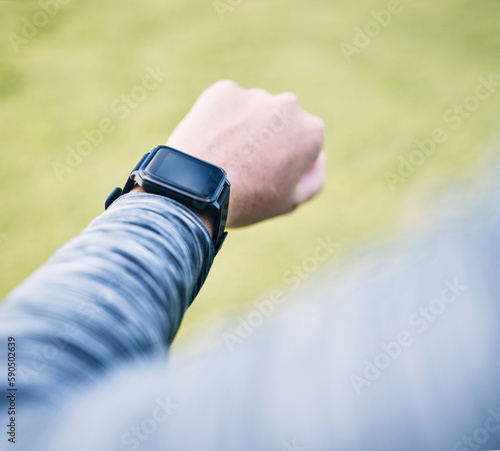 Hand, closeup and smartwatch for fitness, time and track progress after training, workout and practice. Person, athlete and runner with device, timing and exercise for wellness, heart rate and cardio