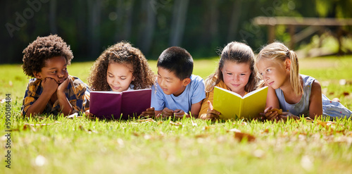Obraz na plátně Children, books and lying in park with friends, learning or diversity for reading at school playground