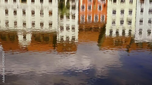 Water reflections of the colorful facades of Zgorzelec. abstract-looking shots of the blurred reflections.
