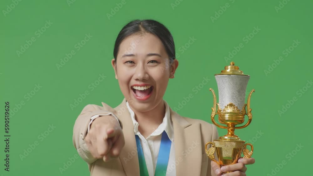 Close Up Of Asian Business Woman In A Suit With A Gold Medal And Trophy ...