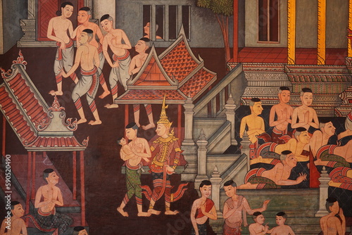 In Wat Pho Church, Bangkok, Thailand, there are old paintings on the walls. for tourists to see and take pictures