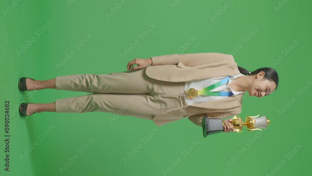 Full Body Of Asian Business Woman In A Suit With A Gold Medal Kissing A ...