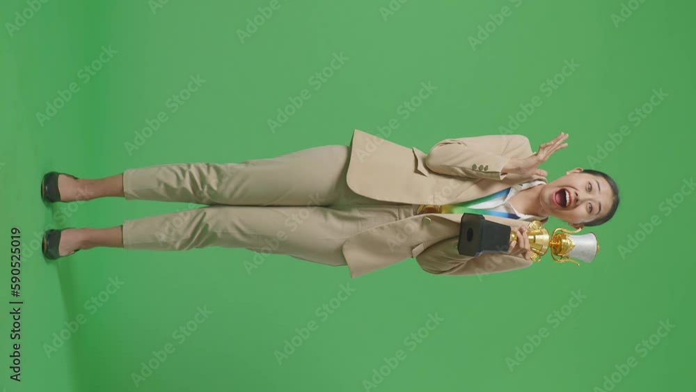 Vidéo Stock Full Body Of Asian Business Woman In A Suit With A Gold ...