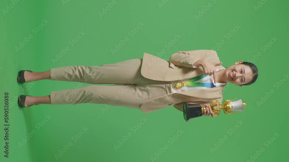 Full Body Of Asian Business Woman In A Suit With A Gold Medal Pointing ...