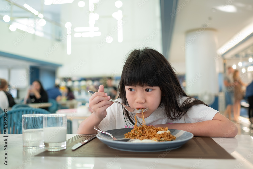 Kid eating food, happy time, breakfast Kid eating food, happy time, breakfast