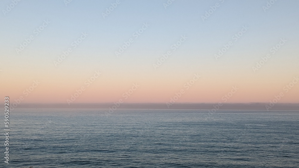 The front view in the morning sky is bright blue with clear white clouds. And the deep indigo of the ocean in broad daylight feeling calm, fresh, relaxing. Gibraltar from Belyounech city in Morocco. The front view in the morning sky is bright blue with clear white clouds. And the deep indigo of the ocean in broad daylight feeling calm, fresh, relaxing. Gibraltar from Belyounech city in Morocco.
