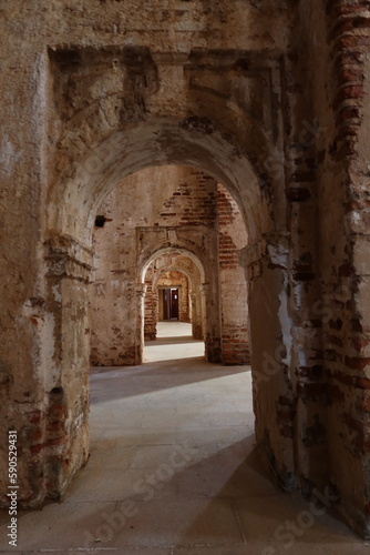 Castano del Robledo, Huelva, Spain, April 2, 2023: Small side arches of the unfinished Church (18th century) of Castano del Robledo, Huelva. Spain