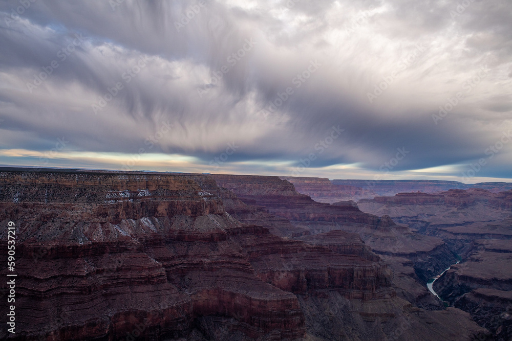 Sunset in the grand canyon on a cloudy day