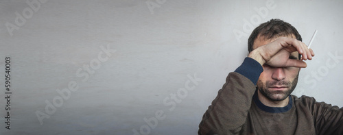 Fotografie Man smoking cigarette. Concept of smoking