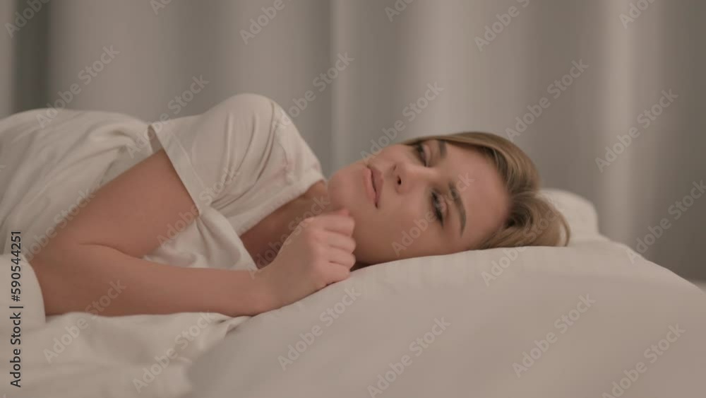 Brainstorming Young Woman Smiling while Lying in Bed Brainstorming Young Woman Smiling while Lying in Bed