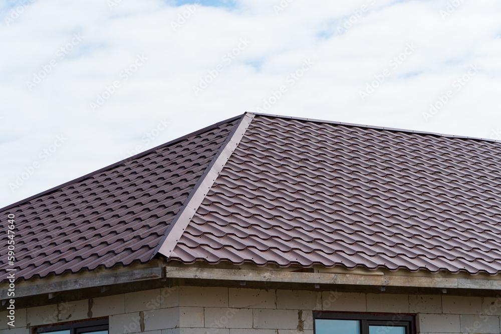 Modern roof made of metal. Modern construction Modern roof made of metal. Modern construction