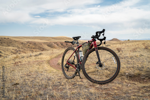 gravel bike on a single track trail in Colorado foothills - Soapstone Prairie Natural Area in early spring scenery