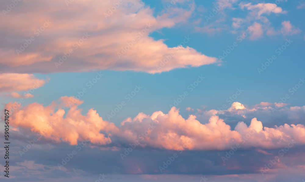 Beautiful evening sky with clouds glowing at sunset