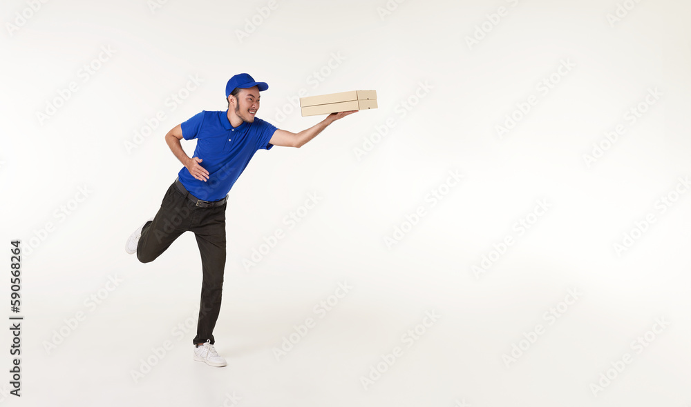 Asian Pizza delivery man wearing in blue uniform holding fresh food paper box and running isolated over white background. express delivery concept. Asian Pizza delivery man wearing in blue uniform holding fresh food paper box and running isolated over white background. express delivery concept.