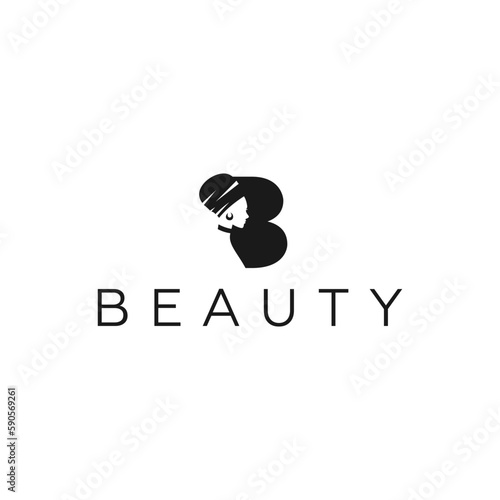 Elegant letter B logo with a silhouette of beautiful African woman wearing headwrap that stands for beauty - color is editable
