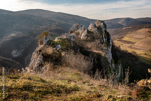 Mountain view peaks, slopes and the canyon of Svrljig (Svrljiske) mountains in Serbia under a beautiful sky photo