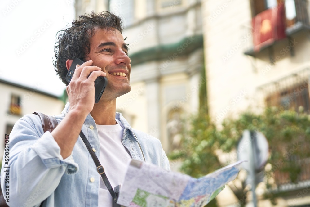 Young man talking on phone in his vacation day Young man talking on phone in his vacation day