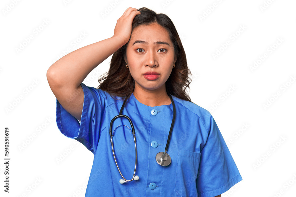 A young nurse chinese woman being shocked, she has remembered important meeting. A young nurse chinese woman being shocked, she has remembered important meeting.