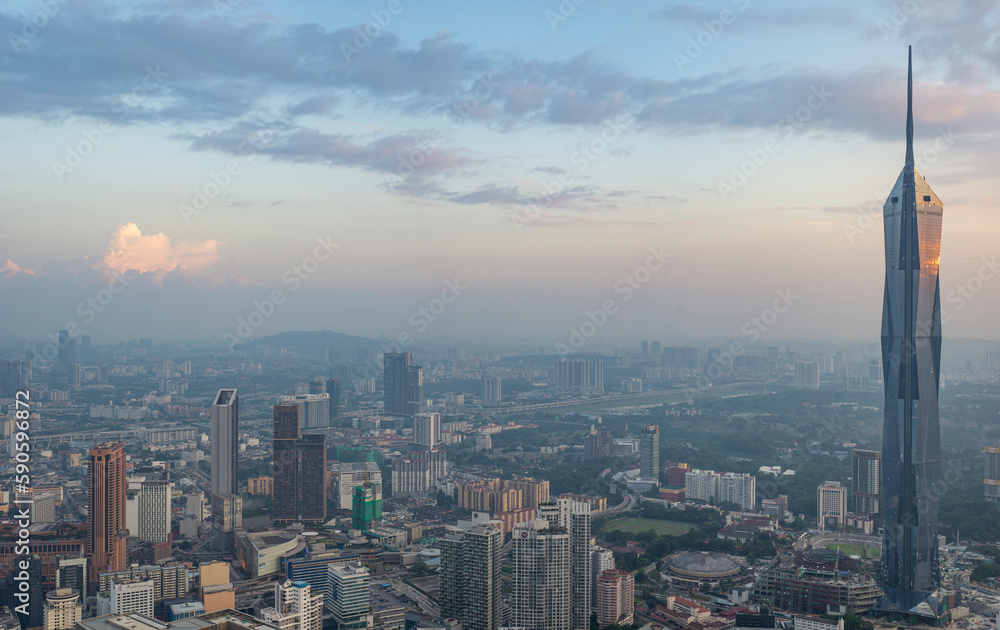 Kuala Lumpur City view with Warisan Merdeka Tower view at sunset time